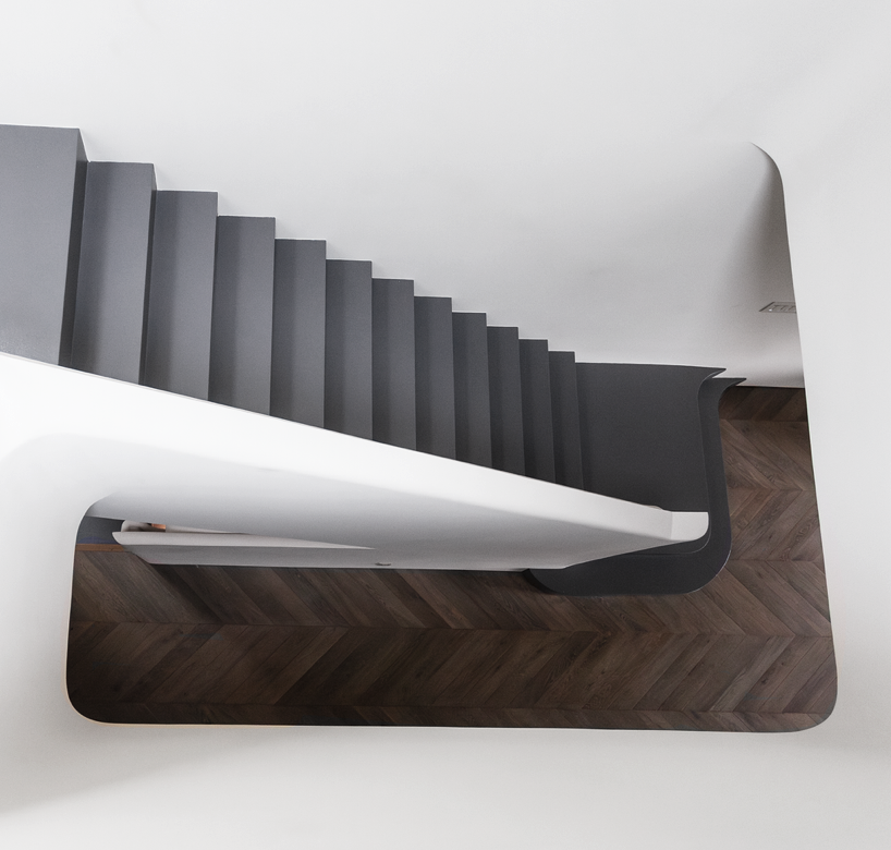 Stair viewed from above over herringbone floor